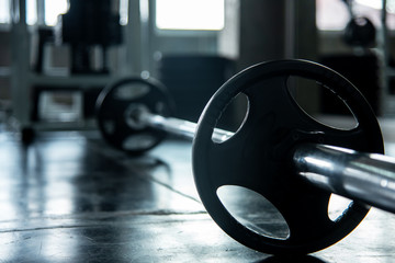 Diverse equipment and machines at the gym workout room for building body and healthy.  Healthy sport Concept