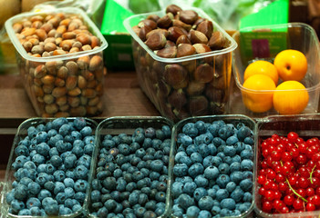 Macro photo berries fruits. Close up berries at market store. Fresh berries fruits. Fruits background. Healthy eating. Fruits on grocery market