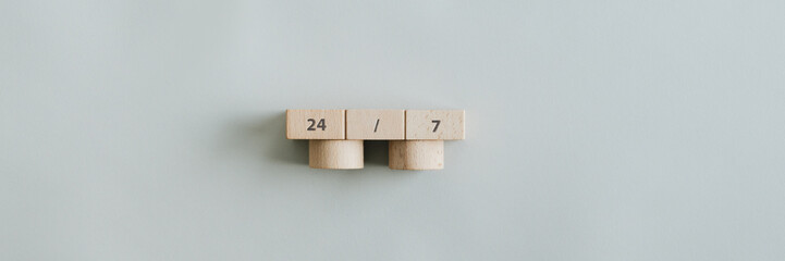 24/7 sign on wooden blocks