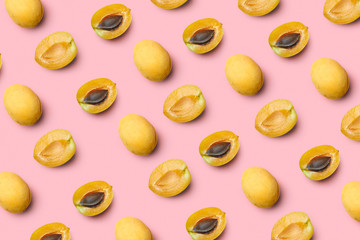 Apricots on a colored background. Pattern of a apricots. Apricots isolated, flat lay, top view