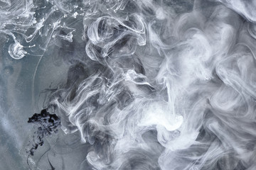 Gray cigarette swirling tobacco smoke abstract background, smog concept, air pollution, anti-smoking