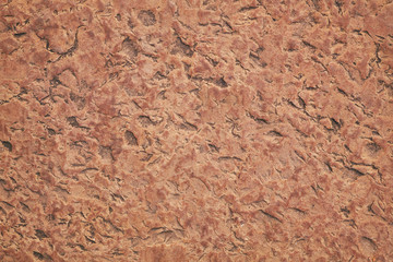 Red and Orange antique Stone Texture with dent and scratches. Stone Texture of medieval fortress wall