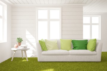 Stylish room in white color with sofa and grass floor. Scandinavian interior design. 3D illustration