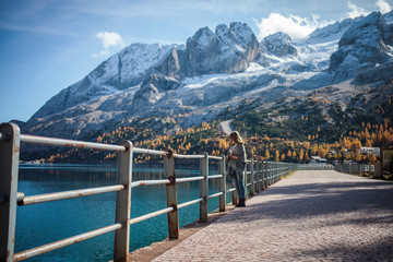 Fototapeta premium Pretty Girl near the Lake in the Dolomites