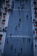 Fototapeta premium A view of people in the road near Saint Peter Square from high