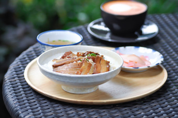 rice topped with pork or pork stew