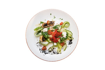 Mushroom garden vegetable salad isolated on white