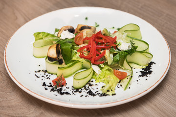 Mushroom garden vegetable salad on the restaurant table