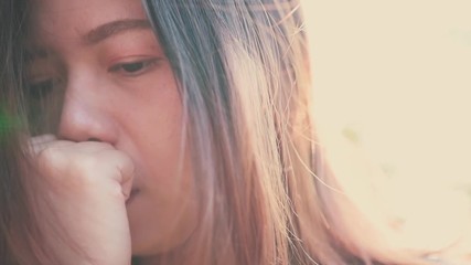 Asian woman sitting alone and depressed,stop abusing domestic violence, health anxiety,people bad frustrated exhausted feeling down
