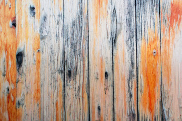 Naklejka premium wooden old fence, remnants of old paint, texture