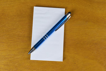 pen with notepad on a table