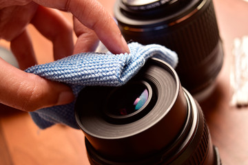Camera lens cleaning with microfiber cloth