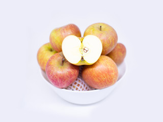 red Apple Honey Core in a bowl on white background