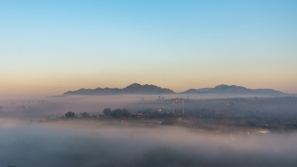 Sea of morning fog over Ban Chan city (Kalayaniwattana district, Chiang Mai, Thailand)
