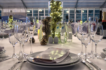 Christmas And New Year Holiday Table Setting with Champagne.