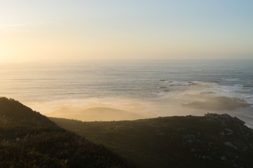 View of the ocean with sea mist from a mountain
