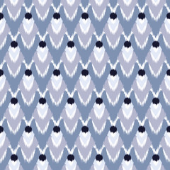 Ikat seamless geometric pattern. Abstract background texture.Pattern can be used for wallpaper and textile, pattern fills, web page background, surface textures.