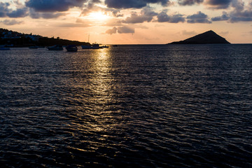Summer morning sunrise/evening sunset over Mediterranean sea scenery in the Porto Rafti bay, Greece, Europe