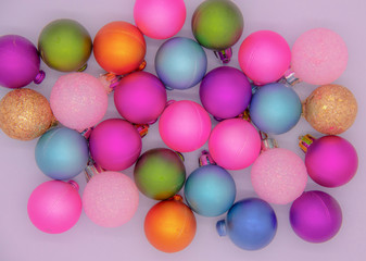 Colorful Christmas balls on a light background.