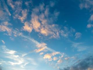 blue sky with pink clouds