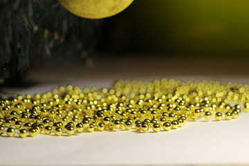CHRISTMAS GOLD BEADS ON GRADIENT BACKGROUND