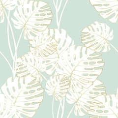 Seamless tropical pattern with monstera leaves. Graphic vector background.