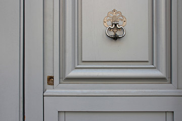 door with knocker in paris (france) 