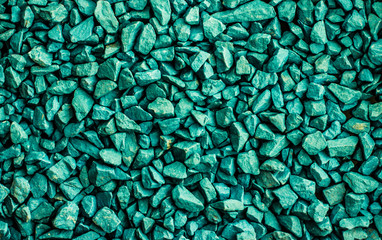 Emerald green stone pebbles as abstract background texture, landscape architecture backdrop,...