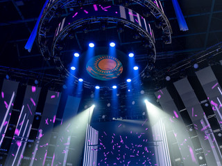 Bright beautiful rays of light on an stage before the concert.