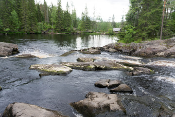 Naklejka na ściany i meble view of the waterfall Park in Ruskeala in Karelia