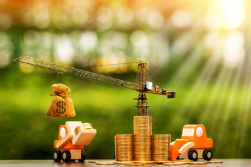 Stack coin with increase and tower crane and hoist brake with money bag and forklift truck and...