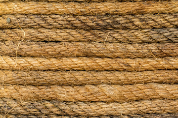 Old brown rope is twist for background texture.