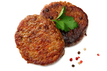 grilled burger meat with spices isolated on white background. top view