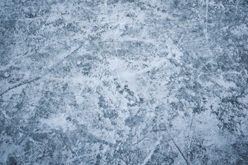 Blue ice with skate scratches