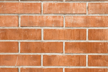 orange brick wall texture background. large brick wall background or texture, close up. Loft style...