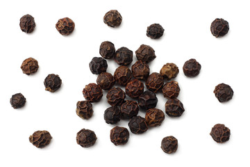 Black peppercorn isolated on white background. top view