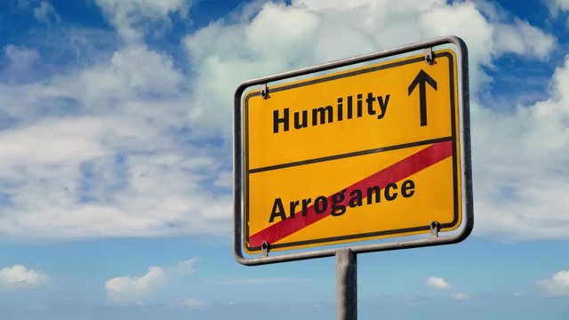Street Sign to Humility versus Arrogance