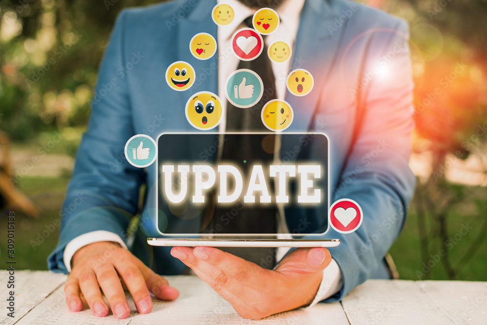 Wall mural text sign showing update. business photo showcasing by adding new information or making corrections 