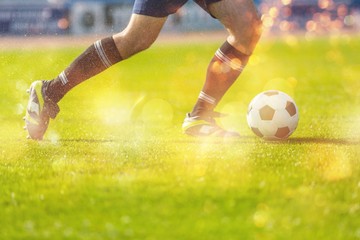 Running soccer player. Soccer football background.