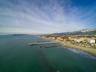 Aerial view in Marina di Massa: the beach and the pier in winter version