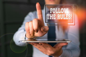 Word writing text Follow The Rules. Business photo showcasing go with regulations governing conduct...