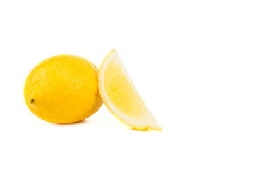 fresh juicy organic whole and cut lemon isolated on white