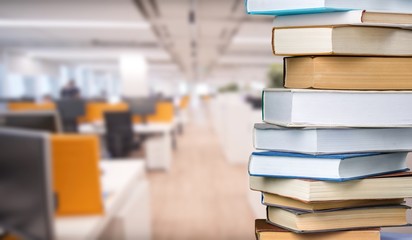 Books collection in pile on background.
