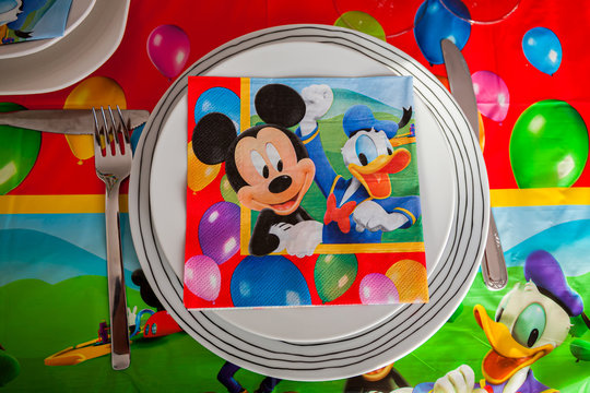 alladolid, Castilla y Le&oacute;n / Spain: April 21, 2013: Table set for children's birthday celebration, decorated with motifs inspired by Mickey and the Disney world