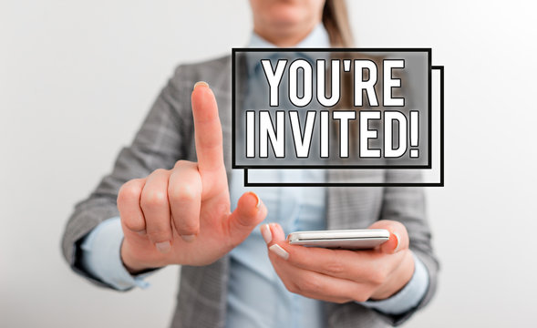 Text sign showing You Re Invited. Business photo text make a polite friendly request to someone go somewhere Business concept with mobile phone and business woman