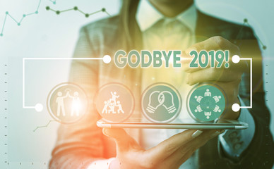 Writing note showing Godbye 2019. Business concept for express good wishes when parting or at the end of last year