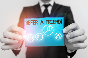 Conceptual hand writing showing Refer A Friend. Concept meaning direct someone to another or send him something like gift
