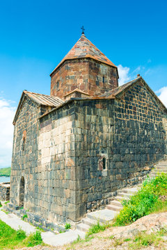 Stone old Armenian Orthodox temple Sevanavank on a hill near Lake Sevan
