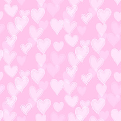 Romantic seamless pattern with cute images of hearts with hand drawn texture. The style of children's drawing.