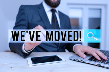 Word writing text We Ve Moved. Business photo showcasing having strong feelings sadness or sympathy has said or done Male human wear formal clothes present presentation use hi tech smartphone